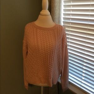 Open back pink sweater with bow detail